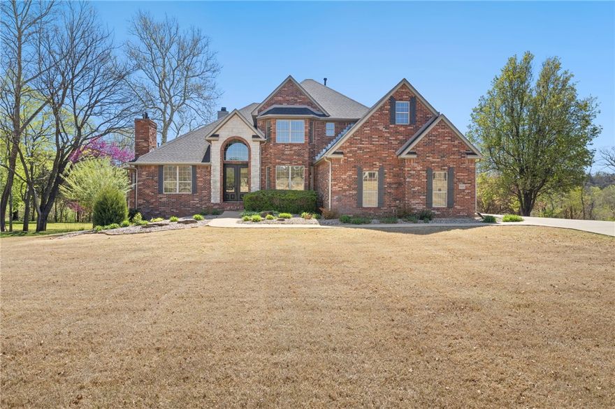 Nestled on 2 acres in the prestigious, gated, Bordeaux Village along the White River in East Fayetteville, this exceptional 5-bedroom, 4.5-bath custom home offers over 4,700 SF of high-end craftsmanship and timeless design. The main level features the master bedroom, 1.5 baths, a gourmet kitchen, a spacious deck with soaring views of the White River, beautiful dining room, office space, large living area with fireplace and a walk-in laundry room. The upstairs offers 3 large bedrooms, 2 full bathrooms and a flex area. The expansive walk-out basement includes a second master bedroom, 1 full bathroom, a flex room with a fireplace, 2 cedar-lined large closets and ample amount of storage space. Additional features include a full-sized garage in the basement, large enough for a boat.  This private, professionally landscaped, tranquil retreat in a desirable gated community is truly a rare find.