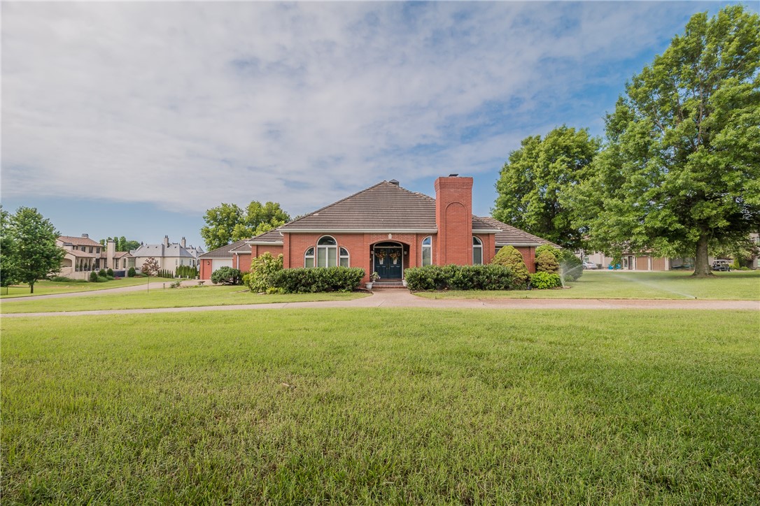 Take advantage of a rare opportunity to own one of the biggest lots in all of Pinnacle Country Club on prestigious Pinnacle Drive overlooking the 17th green. This 1 level home features an open floor plan with 3 bedrooms, 3.5 bathrooms and 3 car garage with workshop space! Large Living Room with built-ins, fireplace and access to sunroom with wall of windows with impressive views of the golf course. Updated eat-in Kitchen with island and bar, spacious Dining Room and second Living Room/Library with stone fireplace. Master suite with large bathroom and dual Master Closets with access to patio and golf course. The outdoor space is completely private and perfect for entertaining, complete with covered patio, large flat backyard and expansive golf course view.
