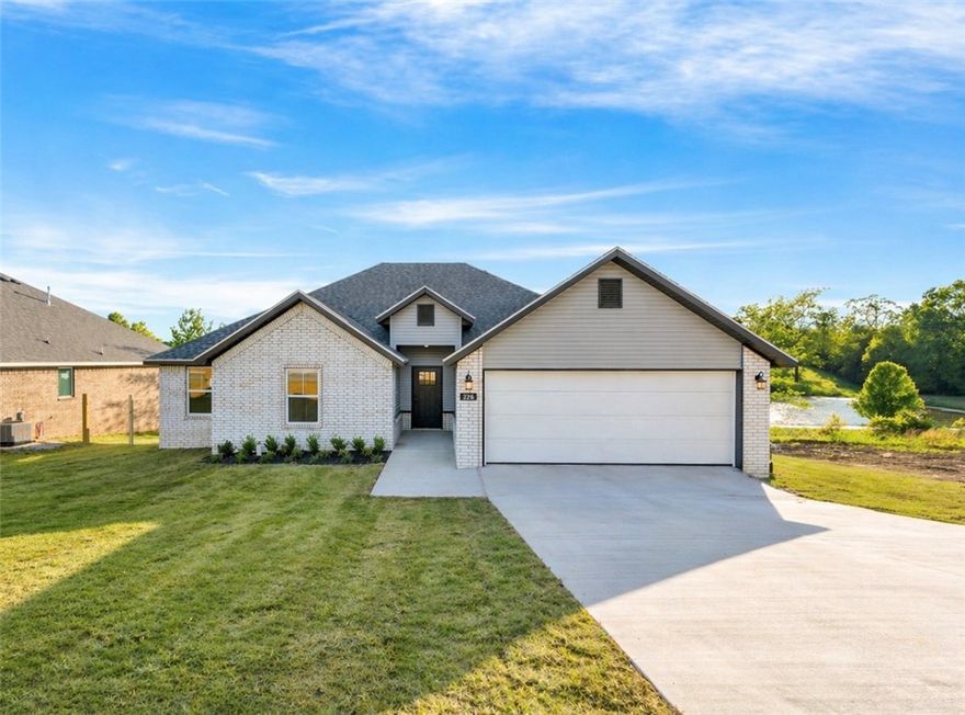 Welcome to Highland Park in Huntsville, a growing community ready to welcome you. This thoughtfully designed 3 bed, 2 bath new construction home boasts a spacious, open floor plan, granite countertops, stainless steel appliances, & luxury vinyl plank flooring throughout. The primary suite offers a spa style bathroom with a walk in shower, large jetted jucuzzi tub, and oversized closets. The living room features a cozy fireplace, creating a warm and inviting atmosphere ideal for gatherings or relaxing. The view from the living room and the back deck is stunning on this one! More homes under construction that will be available soon. This price point is hard to beat in NWA! Schedule a showing and walk through multiple floor plans; take your pick on which is the best fit for you! Listing agent is related to seller.