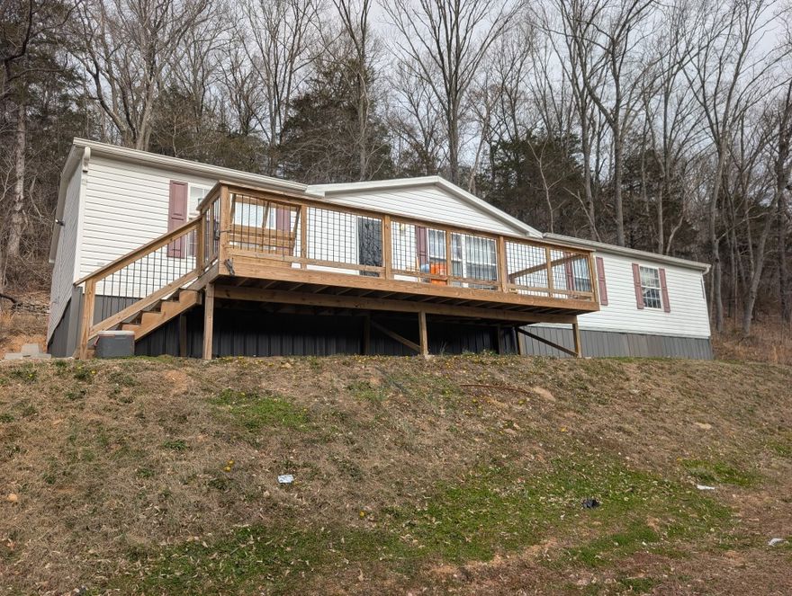Here's a 3 bedroom 2 bath 2008 Fleetwood manufacutred home with split/open floor plan situated on approximately 5 acres, m/l, mostly wooded with large deck.  Home could also be purchased with 12436 Hwy. 412, MLS #  (please add mls # here).   If split, there will be a shared well agreement.  All #s are approx, age & square footage per assessor. Also see MLS#1336713