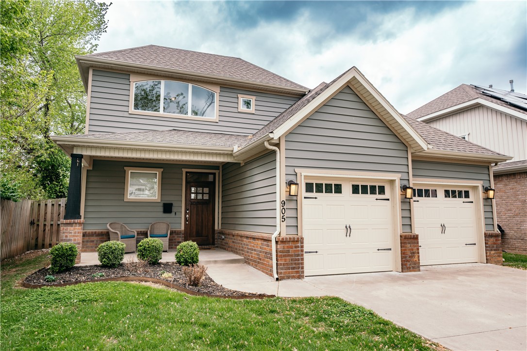 Just North of downtown Bentonville just blocks from the square you can enjoy the museums, mountain bike trails, coffee shops, outdoor events, local restaurants and so many lifestyle amenities. The covered front porch provides evening shade and is a perfect greeting to the home as guest approach. The heated and cooled sun room is great for entertainment and provides access to the perfectly sized backyard. Maintained in a like-new condition the home boasts an open floor plan, high ceilings, beautiful light granite, the upstairs overlooks the living room, 1st floor master with high ceilings, large island, irrigation system, and walk in attic storage. The large backyard has potential for a pool and the entire property has a feel that welcomes you home.
