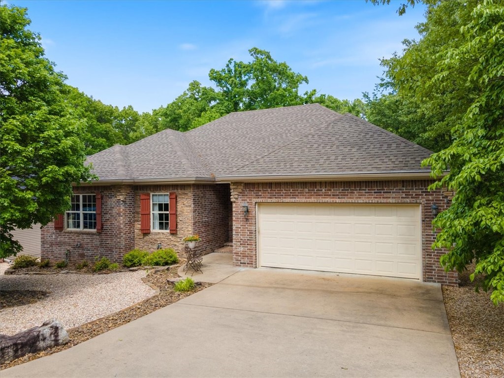 Extraordinary home, with split bedrooms. Wow factor as you enter the front door. New Hardwood floors throughout, no carpet, large kitchen with plentiful storage, two bedrooms with an office or bonus room, large walk-ins closet in the Master bedroom and large closet with extra storage in the guest bedroom. Master bath has a jetted tub. Fabulous, covered deck with sloped roof. Workshop or golf cart storage entrance in rear of the home. This home is move in ready; this is a beautiful home. Washer/Dryer and Refrigerator are included! New roof in 2020.