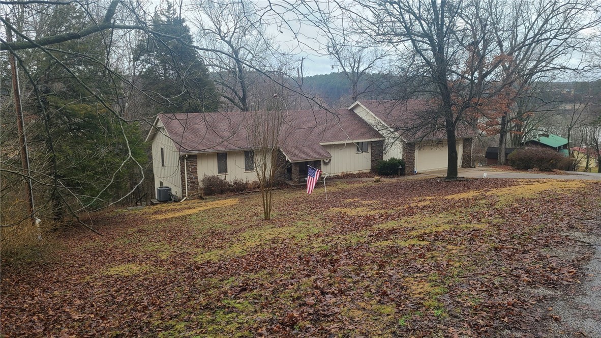 Sold before print. Arms length transaction. Sold to a family member. There is a dated but finished basement that is accessed outside of the home and includes a large room with a window and a bathroom with a shower. The basement is approximately 480 sqft finished, the rest is crawl space/storage. Single boat slip & pontoon boat conveyed with the property. Conventional loan.