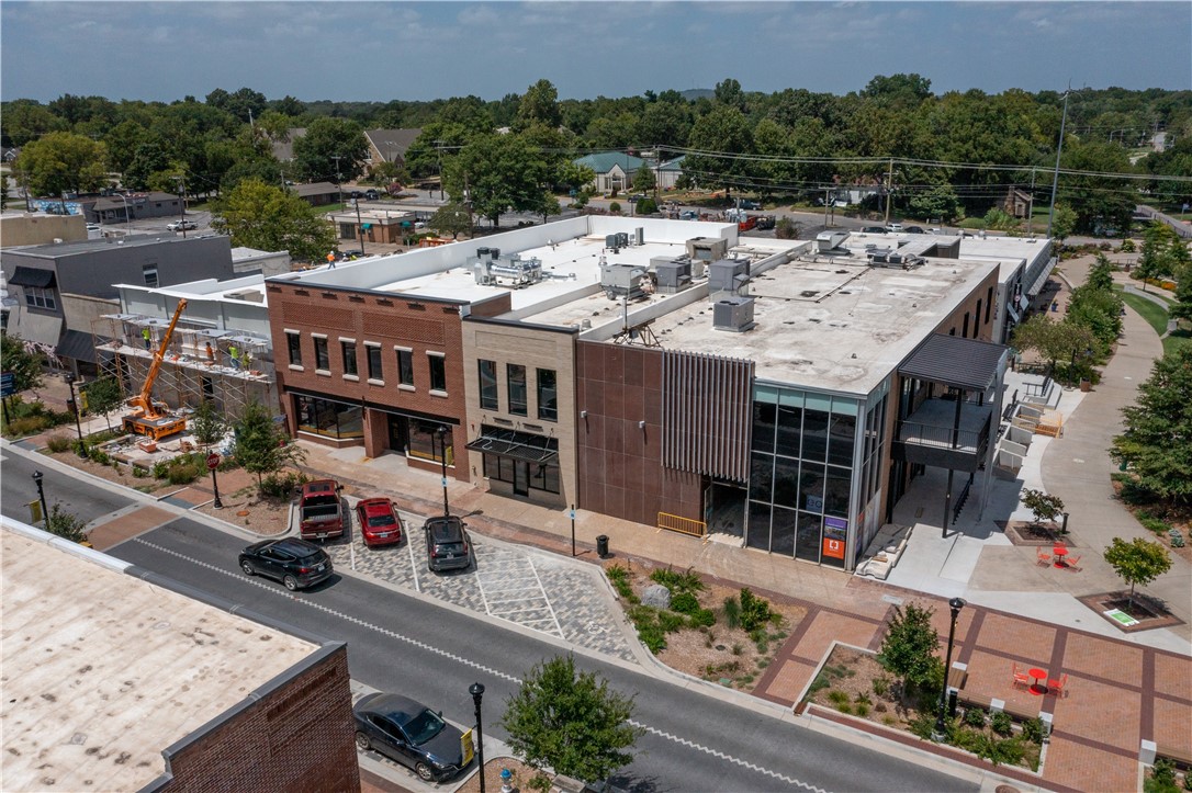 First floor retail space in the historic First Security Bank building adjacent to Turnbow Park and the Razorback Greenway. Lease type is Modified Gross + utilities.