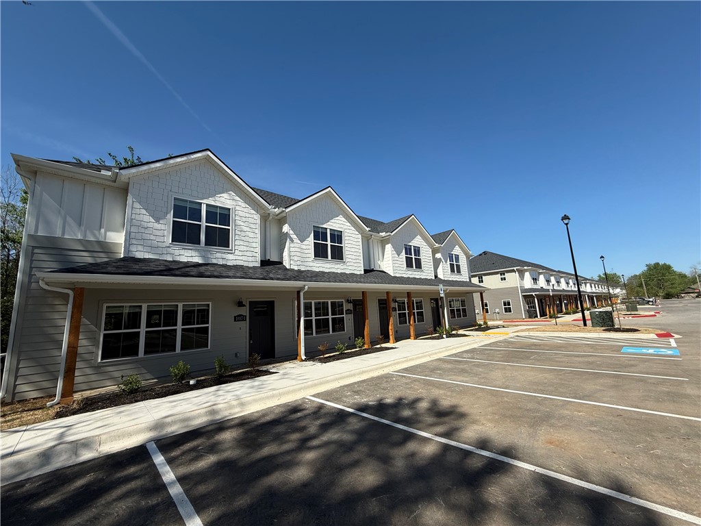 College students welcome! These new construction units are brand new with with 3 bedrooms, 2.5 bathrooms, waterproof flooring throughout, no carpet, upgraded appliance packages, and ample amounts of parking. This will be an awesome place to live that is brand new and close to everything Fayetteville has to offer. Convenient to the U of A, Baum Walker Stadium, I-49, and many restaurants and places to shop. Bring your friend groups to live next to you in other available units and create your own community here at Garland Luxury Living! *Photos are from a different development and the finished unit might vary*