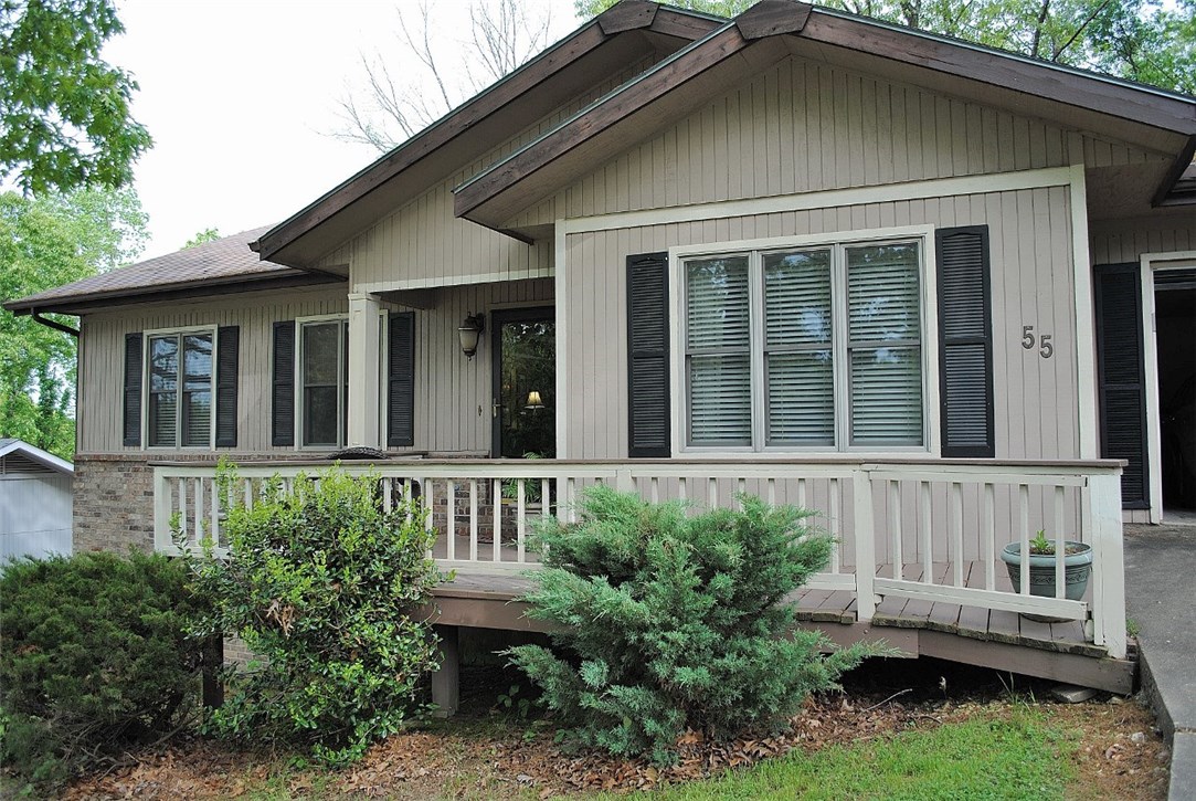 Location, location, location and full of southern charm will make this your next home. Offering one level, 3 bedrooms, 2 baths and 1,798 s.f., sun room, gas log fireplace, split bedrooms, 32x24 heated & cooled shop under house, solid surface counter tops, large back deck and easy care yard. Updates include H.P 2014, H.W. heater 2016, Roof 2008, dishwasher & microwave 2016, Exterior paint 2016, septic pumped 2015, Located close to Kingsdale Recreation Complex and golf courses. Call to see this one TODAY!