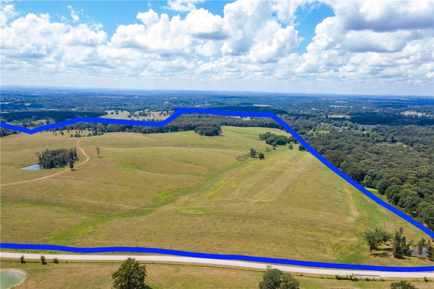 Nothing in Northwest Arkansas like this. Over 920 acres with state of the art cattle working arena
modeled after Texas A&M facilities. Fenced and cross fenced. All cattle stalls have private frost-free
water. Property features a nearly 10 acre spring fed pond (lake) stocked for great fishing. Several other ponds, live springs running through. Buyer to verify utilities (electric at the street). See also, previously listed as two separate listings MLS #s 1155044 and 1155010