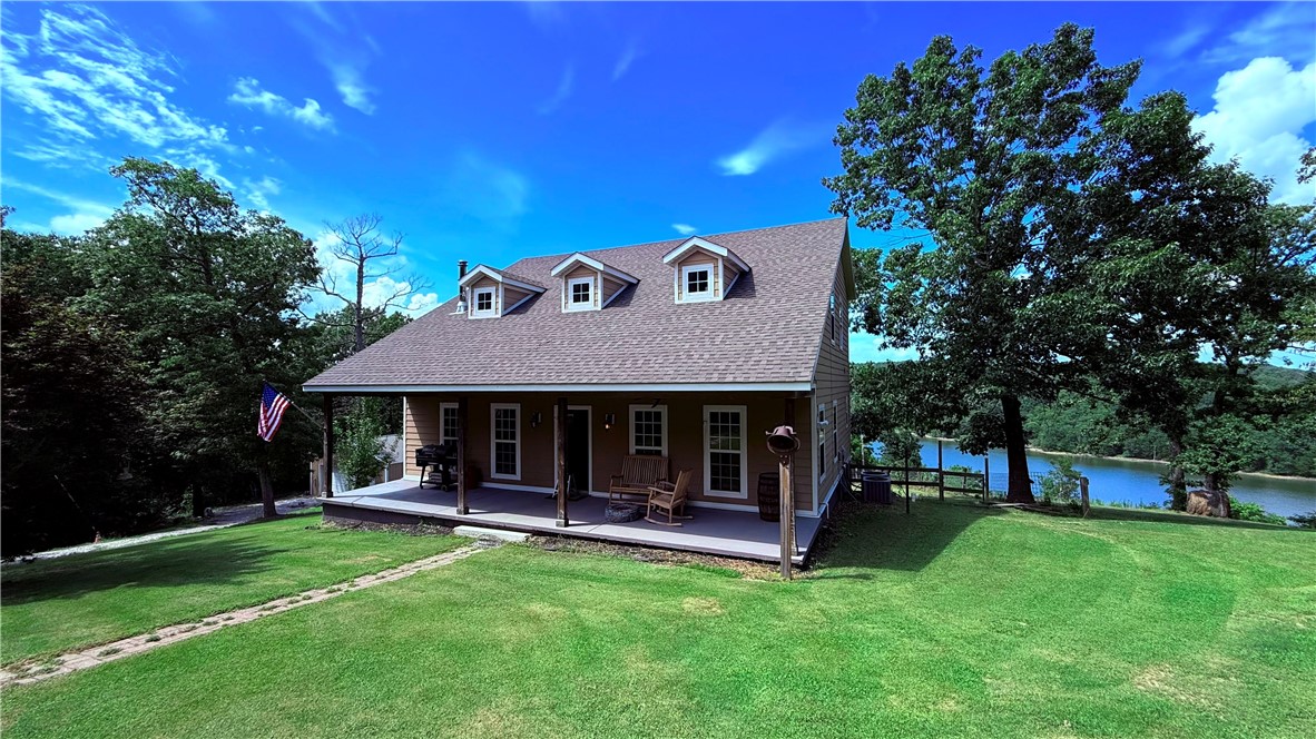 Country living at its best in this lakefront home, ready to sell. Escape to this private 4-bedroom, 2.5-bathroom home near Beaver Lake, offering stunning lake views and 4.28 acres of serenity. The spacious living room features a cozy wood-burning stove, perfect for relaxing evenings. Additional highlights include a 30x40 shop, 24x24 detached carport, and a versatile "she shed." Whether you're looking for a peaceful full-time residence or a weekend retreat, this property has it all. Don't miss out on this rare opportunity!