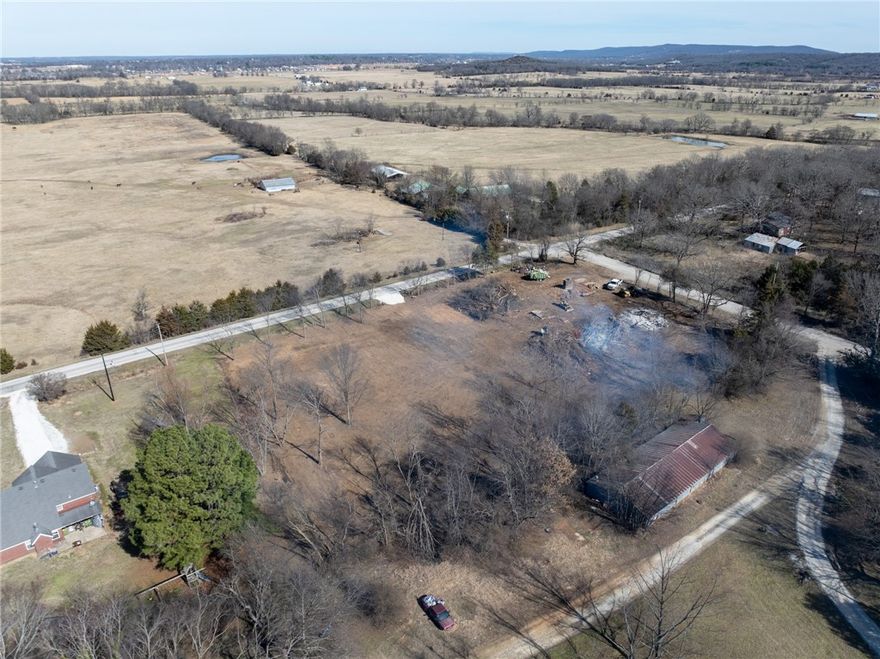 Look at this! A great corner lot, cleared and ready to build on! Perc test has been done, water tap in place, some trees on the property, and a very nice view to the north. Preliminary Survey and Perc Test available. Check out this wonderful location for a nice home! See MLS 1336190