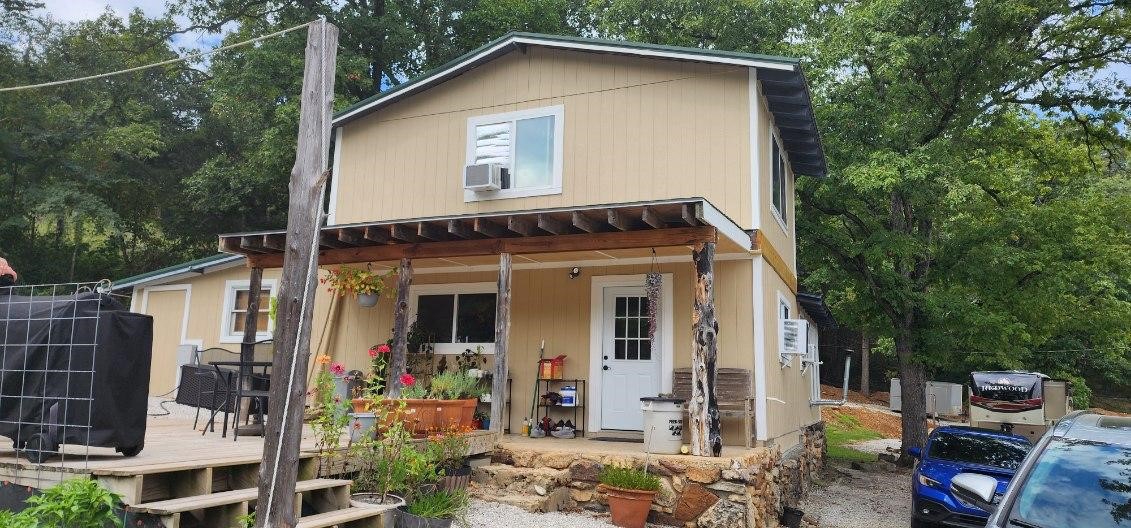 This property has it all! Two caves, new 24x40 shop, new shed, large older barn with loft, new above ground 12x24 pool, newer six person hot tub & nice 39' fifth wheel that can go with property. Home has new floor coverings, new kitchen counter tops, fresh paint, new water heater, new deck, well has new pump and all new wiring. All close to Buffalo River, great hunting, canoeing, or enjoy the caves!