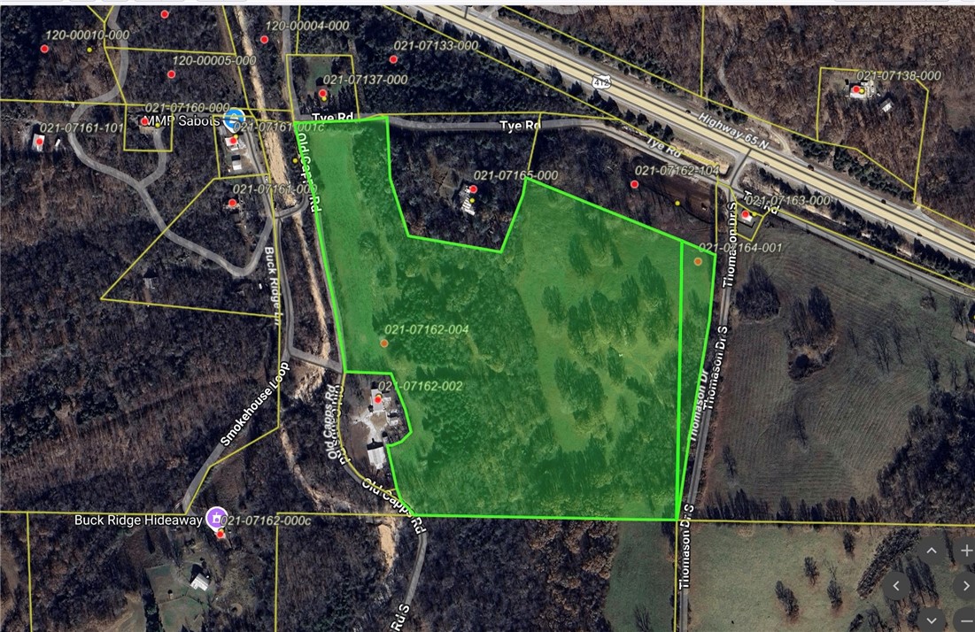 This beautiful 27 m/l acre tract offers the convenience of being just a couple minutes drive from Harrison and great views from several spots on the tract. Located on the highly desired North side of town, mostly fenced, cross fenced and access onto the property from 3 roads, this is an ideal tract for possibly subdividing. With several ideal building sites to choose from, you'll have plenty of options to take advantage of the rolling terrain and scenic views. Electric is nearby, making the property even more build-ready. Whether you're looking to build your dream home, start a hobby farm, or simply enjoy a private escape, this land offers space, seclusion, and natural beautyājust minutes from town! Foliage includes; mature hardwoods, dogwoods, redbuds - deer and turkey have also been spotted. Buyer to verify utilities.