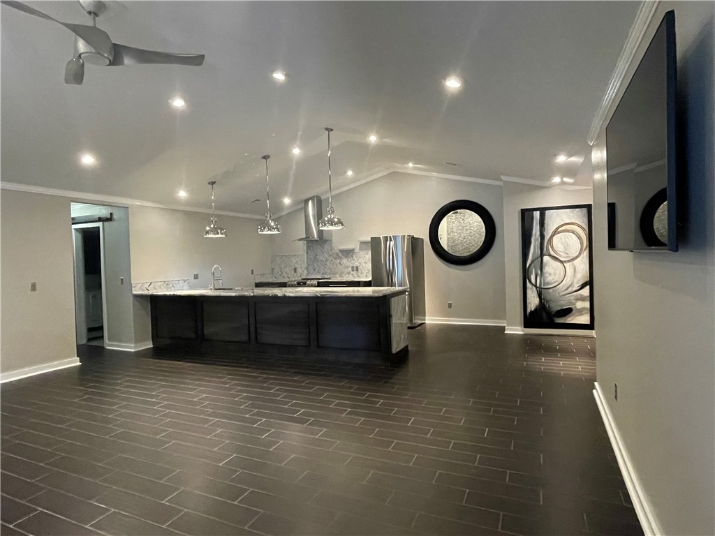 Beautifully Remodeled Home, Conveniently located within the secure, gated Pinnacle Country Club neighborhood. This home boasts the ideal, open-concept Living Room and Kitchen with vaulted ceiling - perfect for entertaining your guests! Featuring extra wide Granite Counter Tops, Large Pantry, and Easy-Start Gas Fireplace. With all new Appliances included: French Door Refrigerator with pullout Freezer below, Stove and smooth surface Range with 5x elements, and Dishwasher. Each Bathroom features a spacious tile shower. The "guest" bathroom includes an LED mirror. Also Provided: Washer and Dryer tucked away in hallway laundry room / Patio Table, Chairs, umberlla, & 3 mounted flatscreen Televisions. Unrivaled Northwest Arkansas location: within 1 mile of endless eats, entertainment, and shopping. Just to name a few: Pinnacle Hills Promenade Mall, Walmart AMP outdoor concert venue, TopGolf, Wellingtons, LOMA, and much more! Liability Renter's Insurance Required. Landscaping and Lawn maintained by POA.