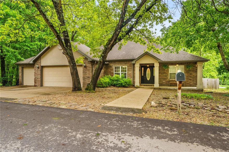Welcome to 2 Saxilby Lane, a charming home tucked away on a peaceful street in Bella Vista! Minutes from Lake Windsor, trails, golf courses, and the amenities Bella Vista is known for, this home offers the perfect blend of comfort, convenience, and outdoor adventure.
Inside, you’ll love the warmth of the hardwood floors and the inviting flow of the open living and dining spaces—perfect for everyday living or entertaining family and friends. The primary suite provides a relaxing retreat, while the additional bedrooms offer flexible space for guests, hobbies, or a home office.
Step outside to a private, tree-lined backyard with a spacious deck—an ideal spot to enjoy your morning coffee, sunsets, or weekend barbecues. Whether you’re searching for a full-time home, a weekend getaway, or an investment opportunity. This home delivers the lifestyle you’ve been looking for. Don't miss your chance—schedule your showing today and experience all that Bella Vista has to offer! Kitchen fridge conveys. New roof being put on!