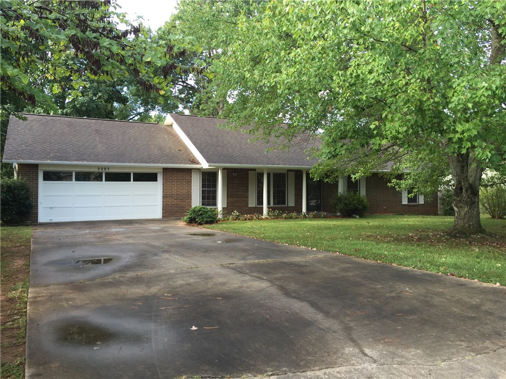 Remodeled home with new paint, floor, cabinets, granite countertops, etc., ready to move in. Large lot with mature trees and landscaped with a rock patio outback. Home offers 2 living rooms and spacious bedrooms with a new master bath and walk-in shower. Lots of storage and walk-in closets. This is a must see!