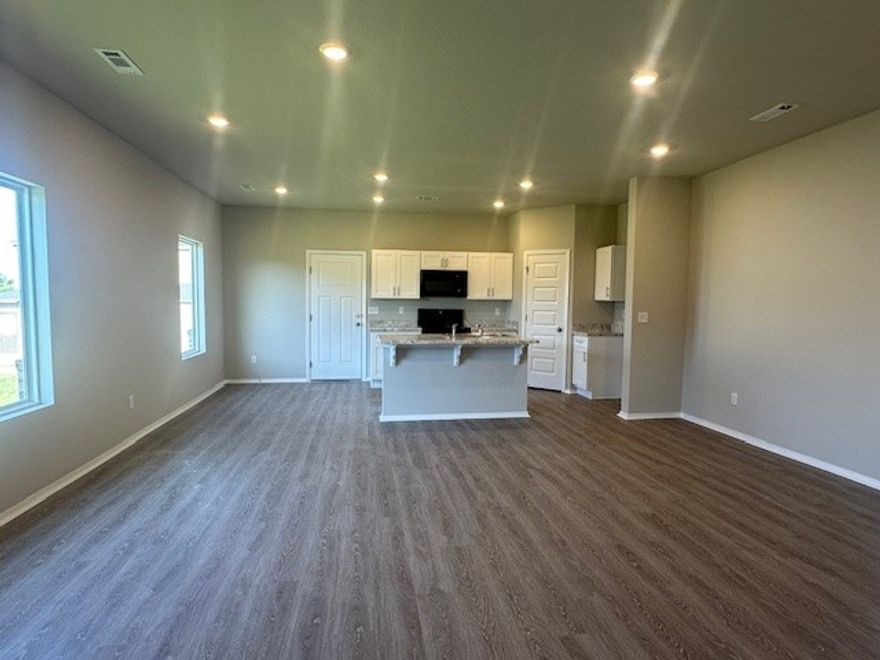 Rent Special - $500 off for for the first 2 month's if signing before 1/31/26! This 3 bedroom, 2.5 bath townhome offers 1,599 sq. ft. of comfortable living space with a 1-car garage. Inside, you'll find an inviting open layout, plenty of natural light, and modern finishes that make the home feel bright and welcoming. The kitchen comes fully equipped with a fridge, dishwasher, stove, and microwave, while the washer and dryer make everyday living easy and stress-free. This is a pet friendly property.  Please note, lawn care is not included. Located in a great spot, this home is perfect for anyone wanting a modern yet cozy space with convenient access to all the best of Northwest Arkansas. **Pics may not be of exact unit**