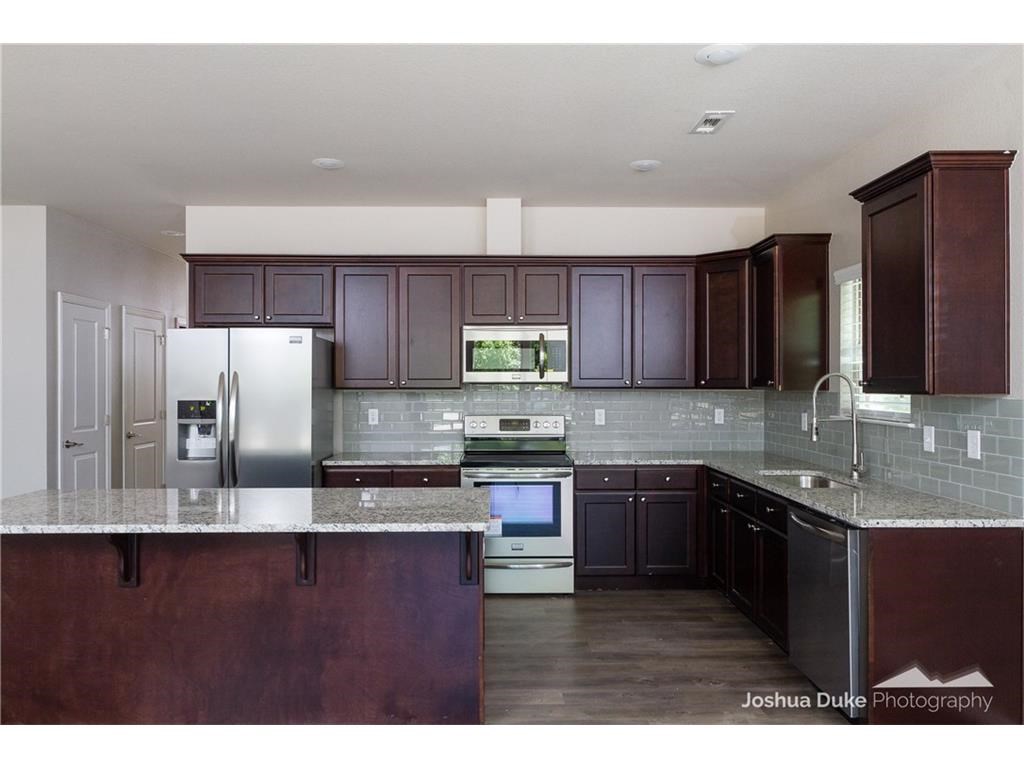 PRE-LEASING, contracts can be signed to start August 1st, 2018. 4 bed/4.5 bath Modern Duplexes walking distance to UofA, shopping, and restaurants!! One block from bus route! Each unit boasts 4 master suites with large bedrooms, walk-in-closets, and full baths. The spacious living room opens to kitchen that includes a large island, granite counter tops, upgraded stainless steel appliances & refrigerator. Downstairs is a 1/2 bath and utility room with washer/dryer included. Yard maintenance provided. 6ft privacy fencing surrounding property.