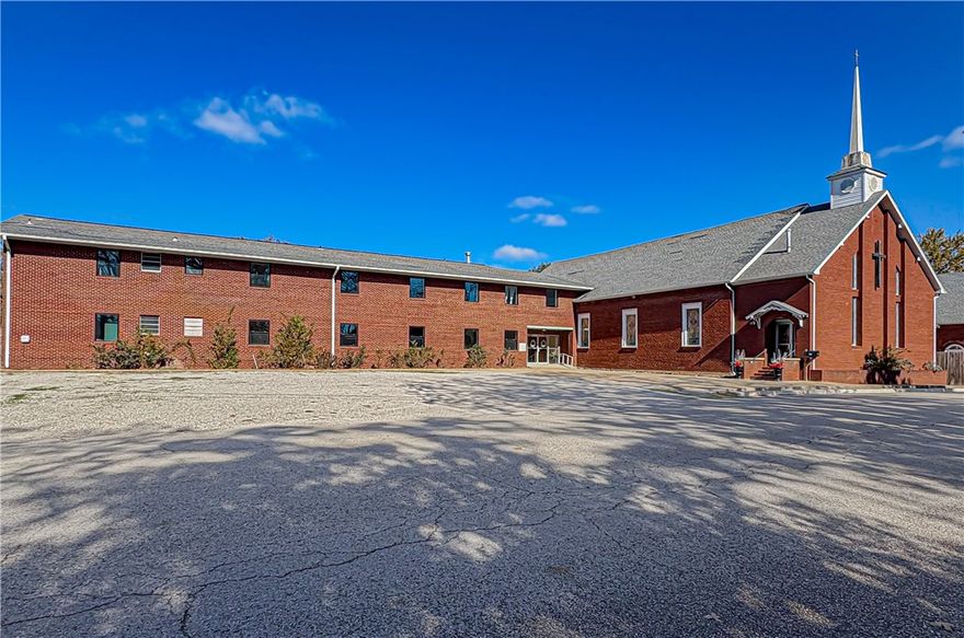 Discover a rare opportunity with this 16,404 sq ft property, formerly a church, offering 2600 sq ft of beautifully finished living space and an expansive unfinished basement ready for your vision. The 3 bedroom, 2 bath living quarters feature high end amenities including copper bathtub, exquisite lighting, and rich hard wood floors. The attached sanctuary space is ideal for events, weddings (with honeymoon suite) family advocacy programs, or can be restored to use as a church with parsonage. Additional rooms offer flexibility for classrooms, offices, or guest suites. Perfectly located near the city square, park and pool, this property blends charm function and potential. Whether you're seeking a unique home, a community hub, or a creative business space, this one-of-a-kind property is a must see. Let your imagination shape the next chapter! Property also listed as residential see MLS#1328585