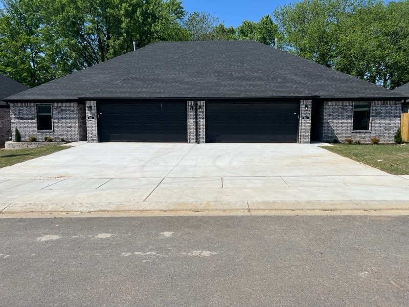 Beautiful new construction duplex coming to you in Gentry! This spacious floor plan includes the split floor plan design and open concept from living to kitchen. Enjoy the features this home has to offer, such as the custom cabinets, custom interior design, undermount sinks, and energy star appliances!