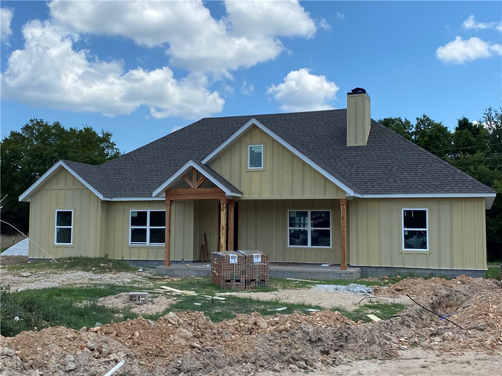 New construction home by Bluewater Development on just over 1 acre of land across from the Pea Ridge City Park & just over a 1/4 mile from Pea Ridge High School. This 3 bedroom, 3 bath home features a large master bedroom with the laundry access off of the master closet. Open floor plan to entertain with kitchen, dining area and great room open to each other. Bedrooms will have carpet, bathrooms and laundry will have ceramic tile, and the main living areas wood flooring. Houses are all electric and built with energy efficiency in mind!