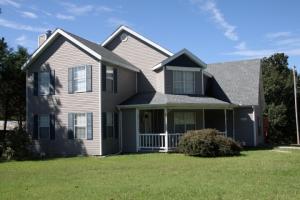Edge of Harrison, two story home with vinyl siding 4 bedrooms, 21/2 bath, eat in kitchen with separate dining. Large family room with gas log fireplace. 1/2 bath on main level. All bedroom upstairs. This is a Fannie Mae Homepath property.