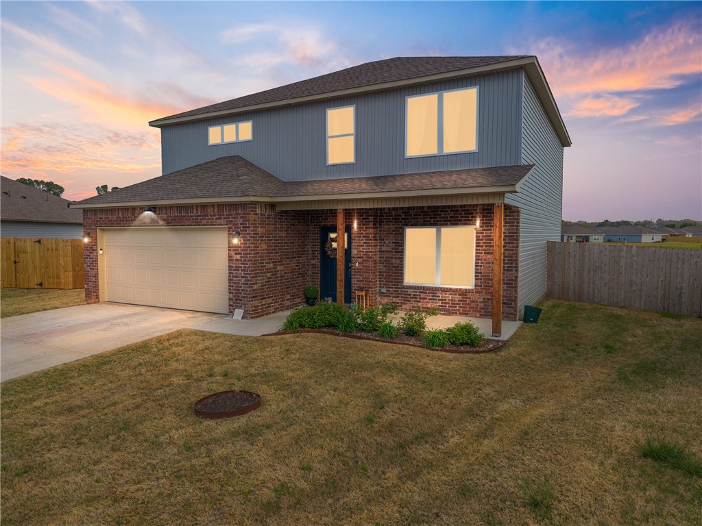 Come see this beautiful home located in the heart of Rogers that is rich with curb appeal with its cozy covered porch and front yard landscaping. Giving you the sense of privacy with no homes built directly behind you, you will be located near local parks and schools while also giving you easy access to all that NWA has to offer. You can be at the Promenade and Top Golf area in roughly 10 minutes, or be getting off the New Walmart Home Office exit in roughly 15 minutes. This two-story home features 4 bedrooms, 2.5 bathrooms, a massive bonus room upstairs, and a large living area downstairs. The master suite is on the first floor and features 2 walk-in closets. The well equipped, energy-efficient kitchen has generous counterspace and a pantry. All the rooms are very generous in space and have great storage and closet space. Don't miss your opportunity to call this one home!