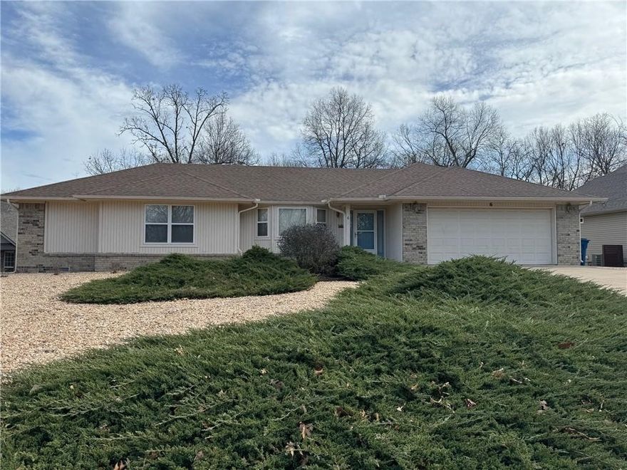 2 bedroom/2 baths plus office or second living room. Additional storage in garage. Exposed deck, wooded view.  All appliances convey, including washer/dryer. Great location. Bentonville schools. Propane tank is for fireplace only, tenant is responsible to fill.