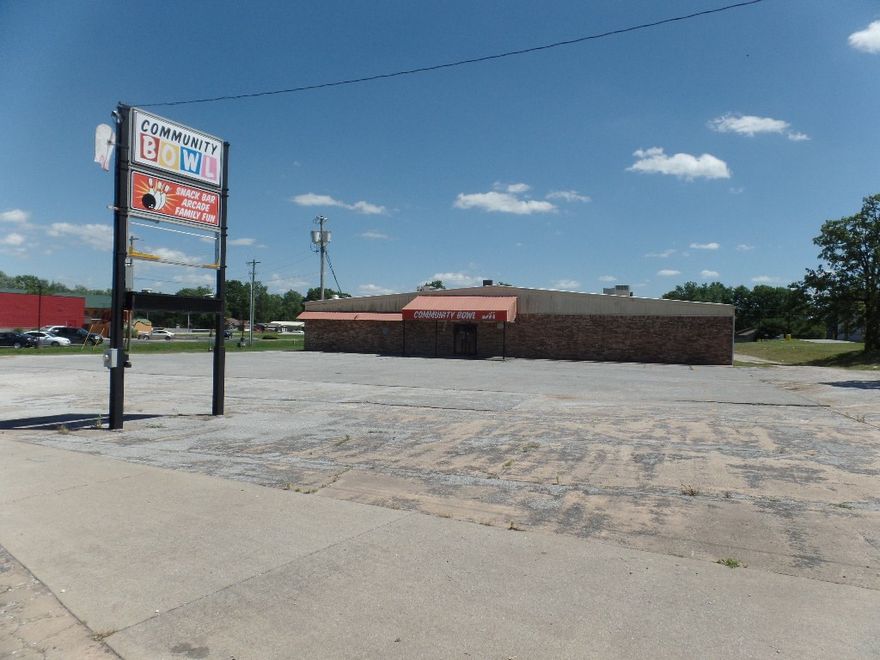 MOTIVATED SELLER! Spectacular location with major highway frontage. Property would be ideal for several uses. Located less than 1 mile from the Cherokee Casino, currently used as a bowling alley. 2.64 acres with front and rear access. Has potential for most any business. Roof is membrane roof. All furnishings, games etc. are negotiable. Great Location