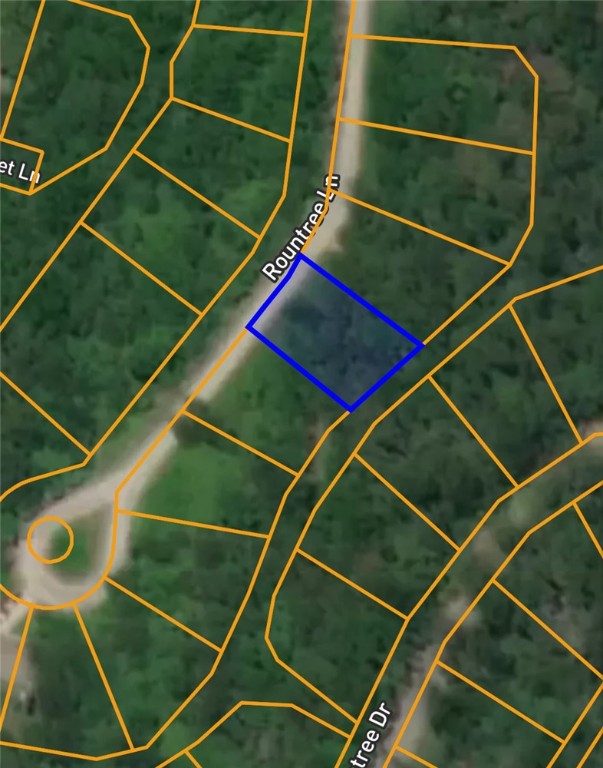 Nestled in the quiet Rountree Subdivision of Bella Vista, this 0.25-acre residential lot offers a prime opportunity for future development or investment. Located in Benton County and within the sought-after Bentonville School District, the lot sits near the end of Rountree Lane, providing added privacy and a wooded, natural setting. With no timber acreage and access to Bella Vista’s extensive amenities, trails, and golf courses, this property is ideal for building your Ozark retreat or expanding your portfolio.
