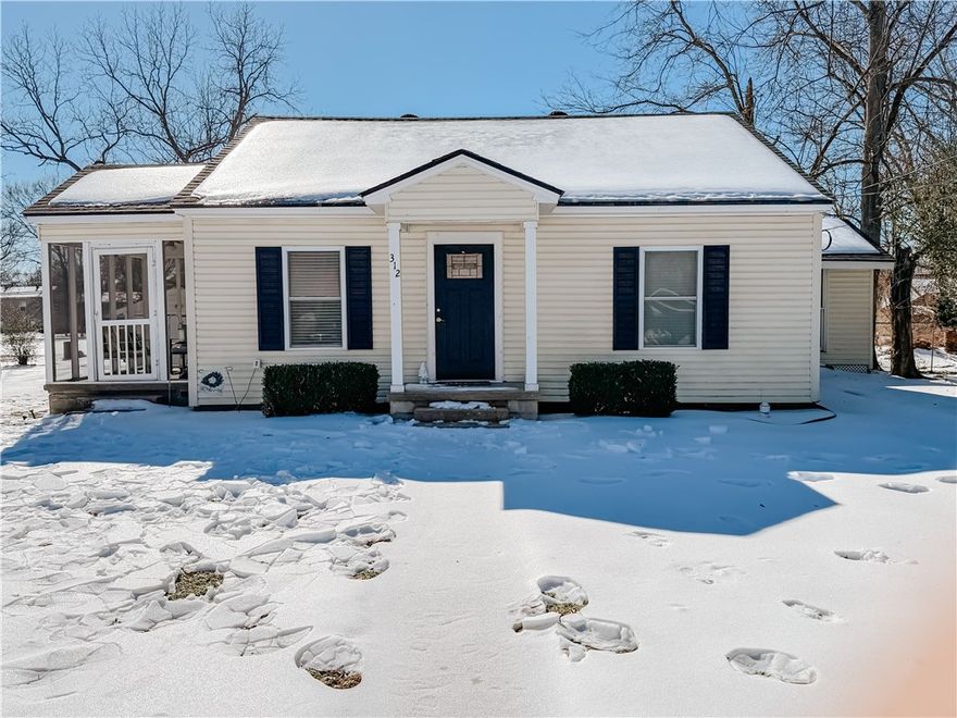 Welcome to this charming 1940 home at 312 E. H St. in the heart of Russellville. This single-level home offers 3 bedrooms and 2 full bathrooms with a thoughtful blend of classic character and modern updates. Inside, you’ll find newly painted interiors, luxury vinyl plank flooring, and a versatile den or office that could also serve as a second living area. The kitchen features granite countertops and connects easily to the main living spaces. A functional mud room adds everyday convenience. Recent updates include a new hot water tank and a new exterior HVAC unit. Outside, enjoy two covered porches—one screened in—perfect for relaxing or entertaining. The property also includes a detached one-car garage and 30-year galvanized shingles. Located near Arkansas Tech University and within walking distance to downtown Russellville’s dining and entertainment, this home offers comfort, charm, and an unbeatable location. Fiber optic internet is available at the street, making it ideal for work-from-home needs.
