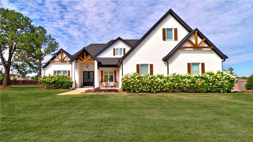 Designer features welcome you to this custom-built, one-owner home that sits on 1.33 acres affording privacy yet in an upscale neighborhood. The home is open & airy w/many well-designed features. Main level features spacious living room w/trayed ceiling & beautiful fireplace w/ lots of natural light, office has amazing built-in shelving, kitchen has an oversized island, a spacious, concealed walk-in pantry, appliance garage, Chef-style appliances & abundance of cabinetry, 2 half baths, Primary BR features 2 walk-in closets, 1 w/stackable washer/dryer connection, & spa-like bath w/expansive dual vanities, vessel tub & walk-in shower. Bonus/media room w/built-in shelves, bar area w/wine fridge, dishwasher & icemaker. Covered patio has doors to LR & media room, & huge yard can accommodate a good-size pool/entertaining area. 2nd level features 2 BRs & hall bath; both BR have big walk-in closets. Too many pluses to list! Don’t miss the opportunity to preview this gorgeous home.