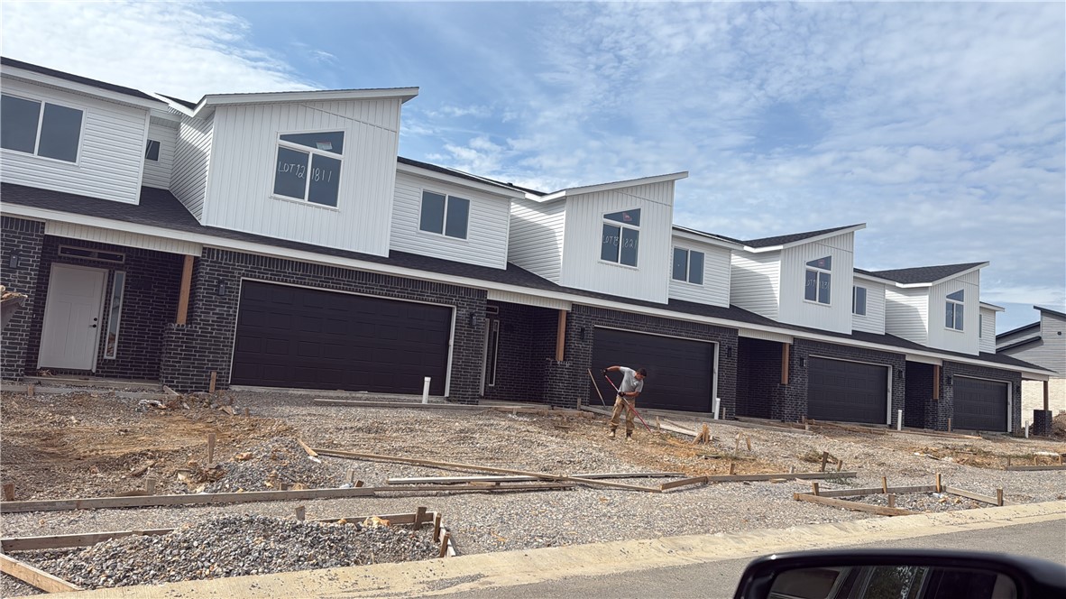 This income-producing property is part of a modern 5 plex building. each unit has its private entrance for added privacy. Conveniently located next to the Centerton Community Center, it provides residents with easy access to local amenities. Whether you’re an investor aiming to maximize rental income or a homeowner interested in living in one unit while renting out the others, this property offers versatile potential. It’s an excellent opportunity to expand or begin your investment portfolio. Schedule a showing today and see the possibilities for yourself.