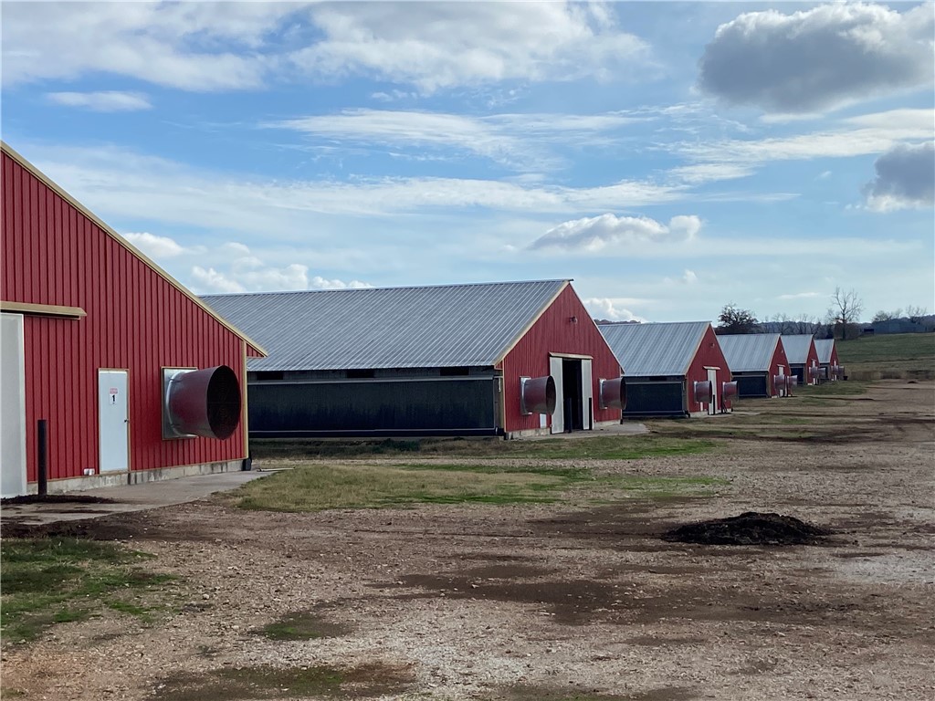Amazing opportunity! 6 - 66x600's built in 2016 (no updates required), Natural Gas, 2 wells, plenty water back up, paved highway to the farm. Brick home, drum litter, litter shed/stacking shed, large shop with generator/water and water storage. Included with negotiated contract is 1 tractor and 1 gator, contingent on selling pending farm (older farm) prior to closing this farm. 60+ ac with flat land for livestock, Choretronics controllers. Simmons big bird program.
************************* BIO SECURE DO NOT ENTER the property *******************
APPOINTMENTS ONLY