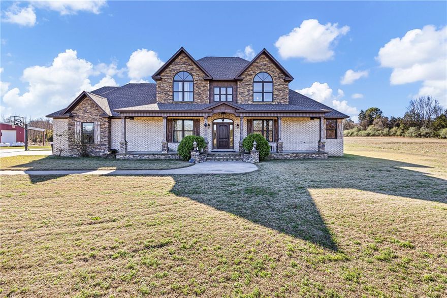 Beautiful home just outside of Atkins offering the perfect country living setup. This stunning 3,400 sq ft home, built in 2012, sits on 40 beautiful acres with a 2,400 sq ft shop that includes finished living quarters. The property also features a horse barn with paddock, plenty of open pasture for fencing or hay meadows, and a good stand of woods ideal for hunting and recreation.

Inside, the home boasts a huge open living area with vaulted ceilings and a gorgeous fireplace that serves as the centerpiece. The kitchen offers abundant cabinet space, a great cooking layout, and lots of countertop room. The primary suite includes a walk-in tile shower and a massive walk-in closet. With multiple bedrooms, tons of storage, and a spacious bonus room upstairs, this home provides all the space your family needs.

This is a rare opportunity to own a beautiful home and acreage in a prime location just minutes from town.