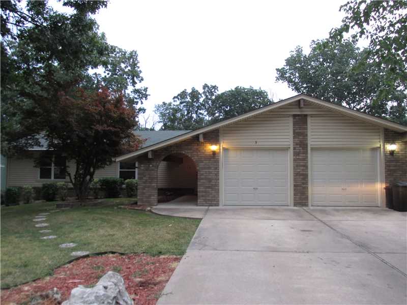 WONDERFULLY MAINTAINED HOME IN BELLA VISTA, PLENTY OF ROOM IN THIS 3 BEDROOM 2 BATH HOME, SPLIT FLOOR PLAN, BEAUTIFUL HARDWOOD FLOORS IN LIVING ROOM AND DINING ROOM, WALKOUT BASEMENT INCLUDES 4 BEDROOM OR OFFICE, LARGE 2ND LIVING ROOM WITH WOOD BURNING,FIREPLACE, AND LOTS OF STORAGE.