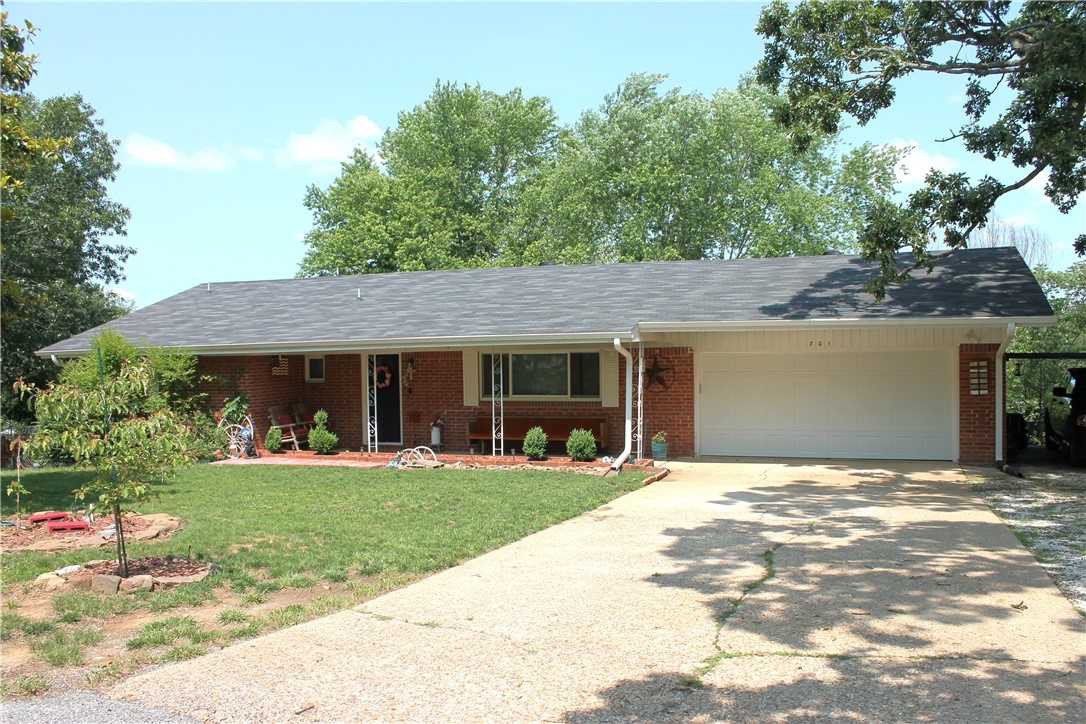 Welcome to this beautifully updated 3-bedroom, 2-bath brick ranch-style home nestled on a spacious corner lot in the heart of Huntsville. With 1,804 sq ft of thoughtfully designed living space, this home blends modern style with cozy farmhouse touches, including stylish shiplap accents and a warm, inviting feel throughout.
Step inside to discover luxury vinyl plank flooring, a bright and open layout, and a gas log fireplace perfect for cozy evenings. The kitchen and living areas are ideal for entertaining, offering seamless flow and low-maintenance finishes.
Enjoy peace of mind with a new roof (2022), new double-pane windows, new gutters, and ample parking pads, including an RV parking pad. The large, fenced backyard is perfect for gatherings, pets, or play, offering plenty of room to relax or garden.
This move-in ready home is clean, stylish, and offers easy maintenance - perfect for families, retirees, or anyone looking to enjoy the best of Northwest Arkansas living.