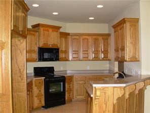 This is a very quite ,close to all NWA & the South part of Washington co. A wooded area & creek are in the back of the property just pass the wooden Privacy fence . Pet friendly.