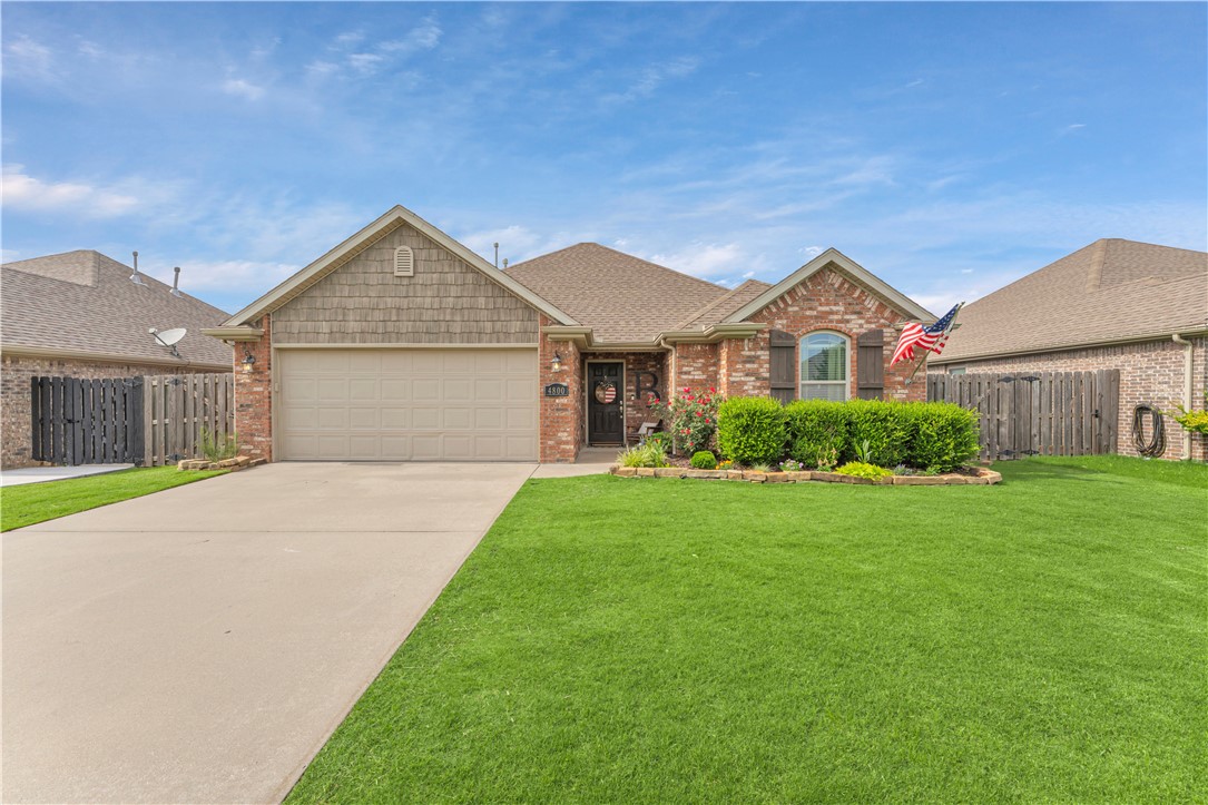 Welcome to this beautifully maintained, one-owner home nestled in the highly sought-after Sloanbrooke neighborhood! Located just minutes from the University of Arkansas, I-49 and all that West Fayetteville has to offer, this home combines convenience with comfort in one of the area’s most established communities. Inside, you'll find upgraded wood tile flooring and fresh paint throughout, creating a warm, move-in-ready atmosphere. The open and functional layout is perfect for both everyday living and entertaining. Step outside to enjoy a covered patio ideal for relaxing evenings or morning coffee. This all-brick home offers durability and low maintenance, while the neighborhood enhances your lifestyle with scenic ponds and walking trails—perfect for strolls, jogs or simply enjoying the outdoors. Don’t miss this rare opportunity to own a lovingly cared-for home in a neighborhood that continues to grow in popularity!