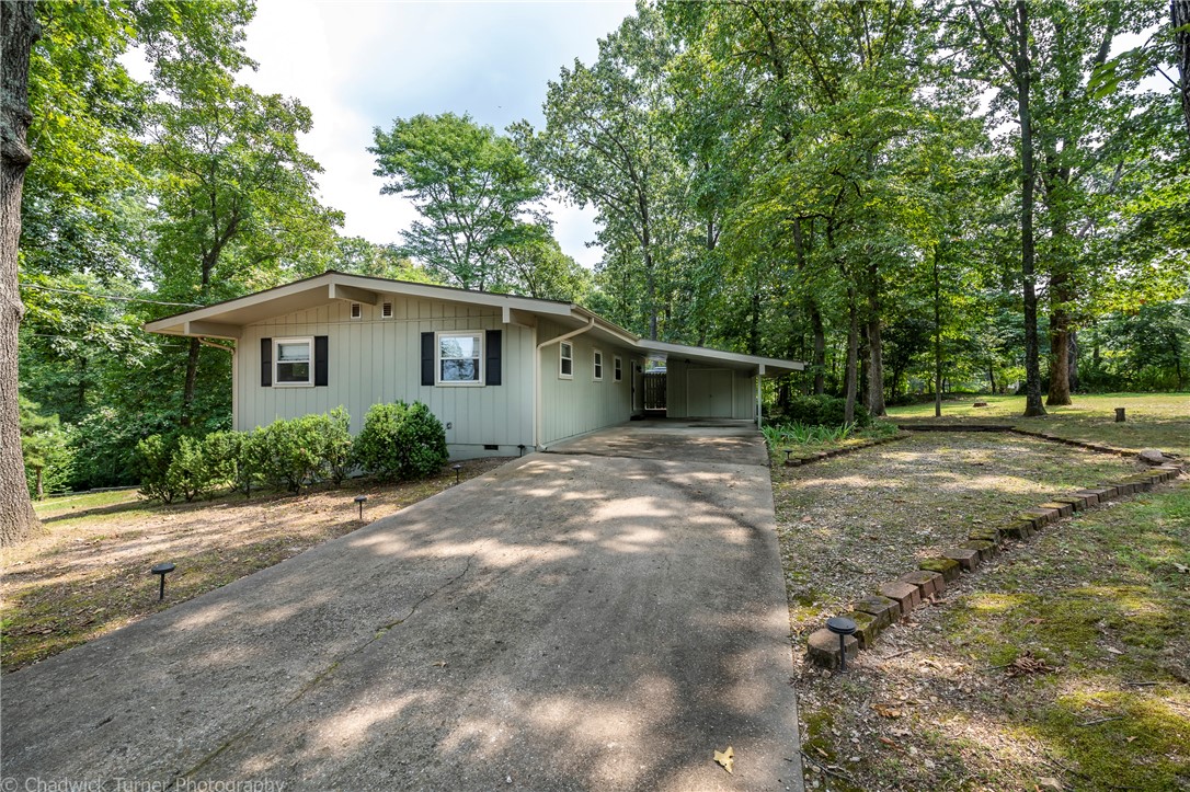 Beautifully furnished month-to-month executive rental. Equipped with everything you need – Cox Cable TV, high speed internet and whole house WiFi, all kitchen gear (plates, glasses, utensils, pots/pans) and small appliances, bed linens, towels, etc. Just bring your suitcase! House is in beautiful wooded location yet so near to Hwy 71 and Bentonville, as well as Bella Vista’s golf courses, lakes, swimming pools and other recreational facilities. And it’s a mountain biker’s delight – bike right off the deck and onto the Tunnel Vision Trail directly adjoining the backyard. You have to see this special house to believe it’s true. 1 small dog allowed not over 25 lbs a $500 non-refundable deposit required. No cats allowed. Minimum of 2 months rental.