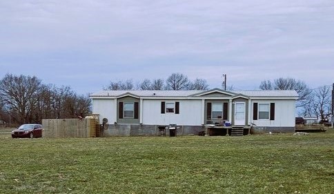 Charming 3-Bedroom Home with Spacious Workshop on 1.86 Acres Nestled on a peaceful 1.86-acre lot in Pea Ridge, this well-maintained 3-bedroom, 2-bathroom manufactured home offers the perfect blend of comfort and functionality. The open and inviting floor plan provides ample living space, while large windows fill the home with natural light. A standout feature of this property is the 30x50 metal shop, ideal for a workshop, storage, or home business. Whether you're looking for extra space for hobbies or practical work needs, this versatile structure adds incredible value to the property. Enjoy the privacy and space of country living while still being conveniently located near local amenities and schools. With plenty of room to expand and endless possibilities, this property is a rare find in the growing Pea Ridge area. Don’t miss this opportunity—schedule a showing today!
