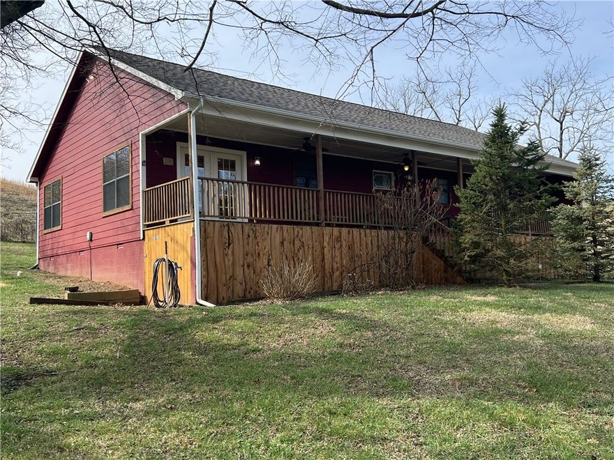 Two Homes near Boxley Valley and the Buffalo National River!!! 3BR-2BA home on 1.56 acres plus a 2BR-2BA mobile with 960 sqft!! The 1,456 sqft main house includes a 8 x 51 covered front porch and 7.5 x 21 covered back porch, handicap accessibility, wood fireplace, two walk-in closets, new roofs in 2022 on both homes. The 2019 mobile is on a permanent foundation with a separate water meter and septic. Property includes rural water, car carport, 20x20 covered sitting area, 10x12 storage building, and a 10x16 storage building with covered porch that is wired for electric, and fruit trees. On paved road only 5 miles from the historic Boxley Valley church and only 1/4 mile from the National Forest! The homes come fully furnished and are used as nightly rentals currently.