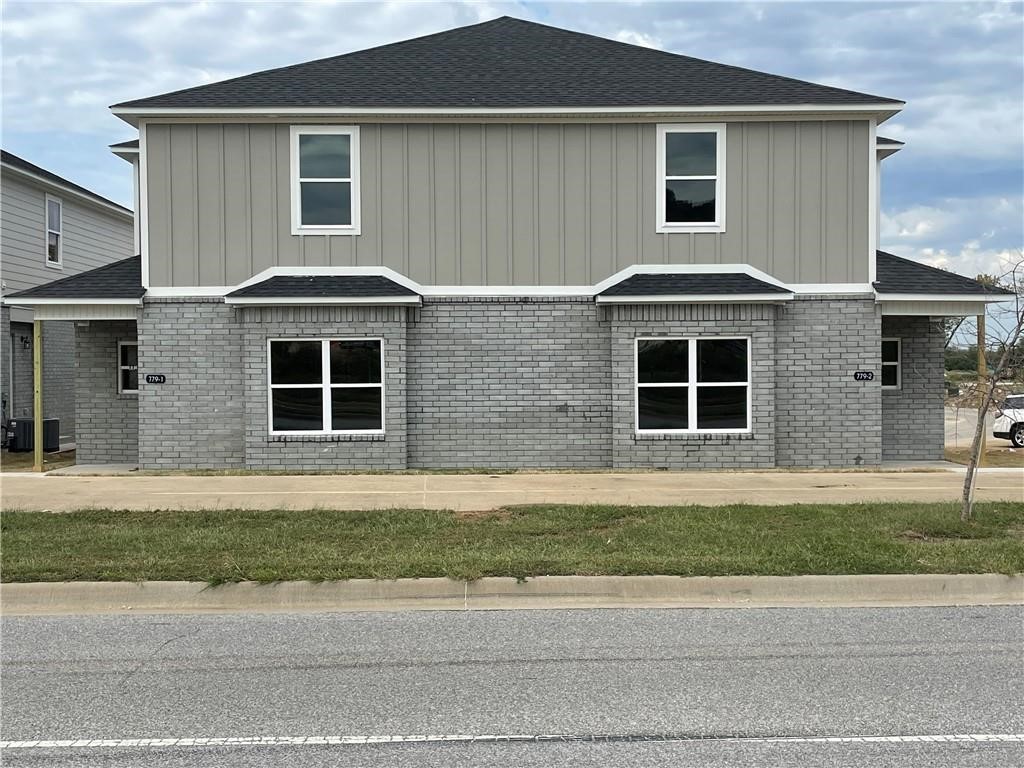 1 duplex, 2 units. Perfect for University of Arkansas students. Spacious open floor plan with beautiful granite counter tops in the kitchen and bathrooms. Fresh, neutral colors. Contemporary lighting fixtures. En suite and jack and jill bathrooms. Convenient upstairs washer and dryer location. Front covered entry. Secure, private rear access to garage.