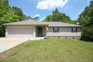 HIGH QUALITY & CUSTOM BUILT 3BR/2BA Home on just over 2 BEAUTIFUL wooded acres that's ALL ON PAVEMENT! Check out this big, open KITCHEN with a Nice walk-in Pantry! Tray ceilings in the Living Room and Master Bedroom with LARGE 6 ft Jacuzzi Tub in the Master Bathroom. HUGE multi-tiered deck that looks out over a big, serene backyard with a nice outbuilding as well!