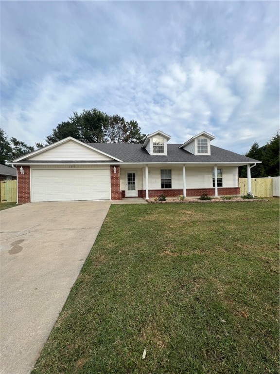 Discover this charming 3-bedroom, 2-bath home with a 2-car garage, perfectly situated on the SE side of town. Enjoy the convenience of being close to dining, shopping, and local amenities. The interior has been freshly painted throughout and features durable vinyl plank flooring in the living areas. Cozy up by the gas log fireplace or cook on the gas stove in the spacious eat-in kitchen. The large fenced backyard offers privacy and plenty of room for outdoor activities.
