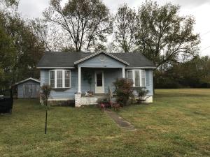 Vinyl sided home situated on 1 acre with detached 2 car carport. Home features 3 bedrooms, 2 full baths and 1240 square feet of living space. This is the estate of Curtis Morse, property sold as is where is, no repairs. Father's estate of Listing agent. Any offer subject to judge approval.