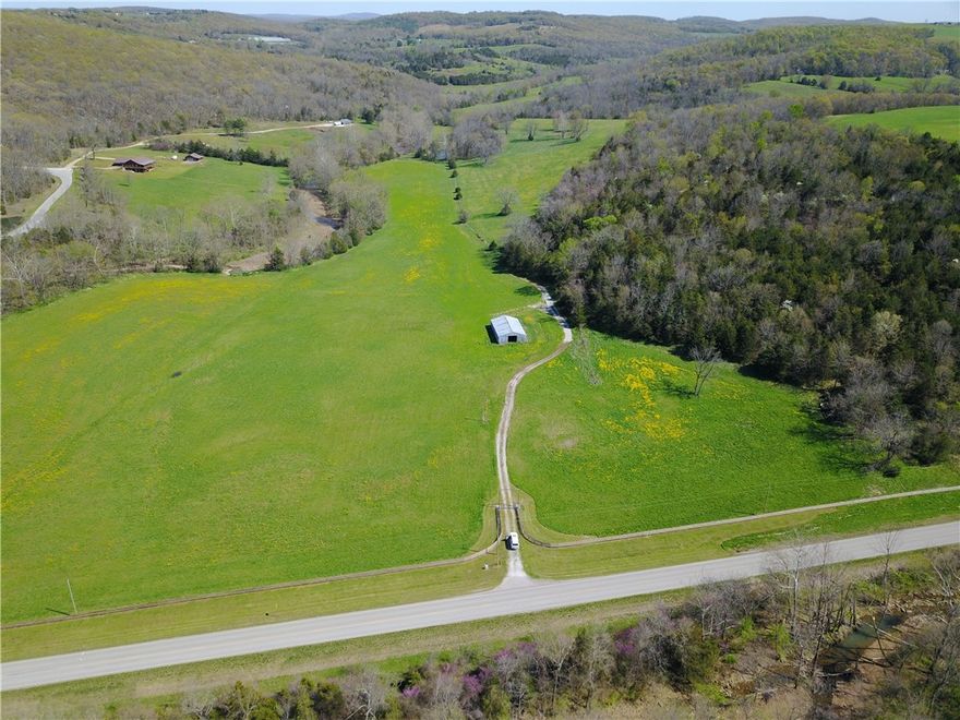 Rare opportunity to own a large 205 acre MOL farm, close to town featuring lots of Hwy frontage and pasture and woods!  These farms are getting harder to find and this one is amazing!  Considerable resources expended in the last few years making this farm a one of a kind.  Lots of pasture with a creek making up the northern boarder.  Mostly fenced with a beautiful, almost new split rail fence running the length of the considerable Hwy 74 frontage.  Close to town and virtually adjacent to the Huntsville Airport and Oakridge Golf Course.