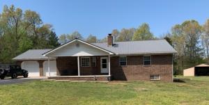 Offered at auction as is, with reserve April 24th at 11:00 a.m. Please register your buyers with Harp and Associates prior to the auction.Nice home with many nice features: Paved Drive, Large Front Porch, Back Deck, Out buildings, Large pantry/laundry, full partially finished basement.
