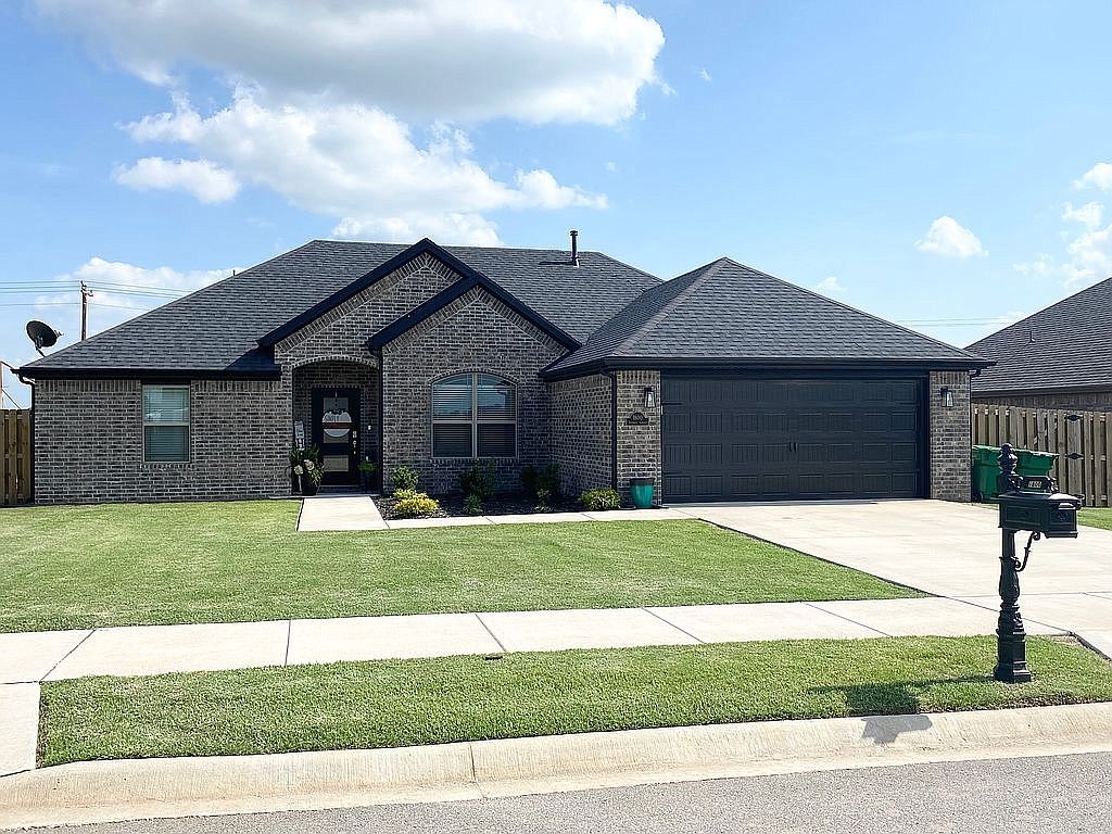 Less than 2 years old, this smart home comes with Nest Thermostat, Ring doorbells and wifi enabled switches in several places. Step inside this 3 bed 2 bath home to an open area with loads of windows. The open space includes a Formal Dining, a Living area w/ a gas log fireplace, a spacious Eat-In Kitchen with granite counters, tons of cabinets with sleek hardware, all on beautiful wood-look tile floors for easy living! Enjoy designer touches all thru out. The Owner’s Suite is private with a spa-like bath, tiled walk-in shower, dual sinks, and a spacious closet. The two bedrooms offer great walk-in closets and share a hall bath.