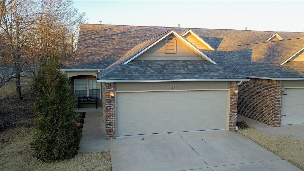 hard to find one level townhouse in great location. POA dues include insurance on the structure and exterior maintenance which includes yard.....poa is responsible for roof and street. roof was replaced in 2024. great floorplan with two master suites w lg baths and closets. could use some updating and flooring, but necessary. complex adjoins rogers bike trail/greenway.