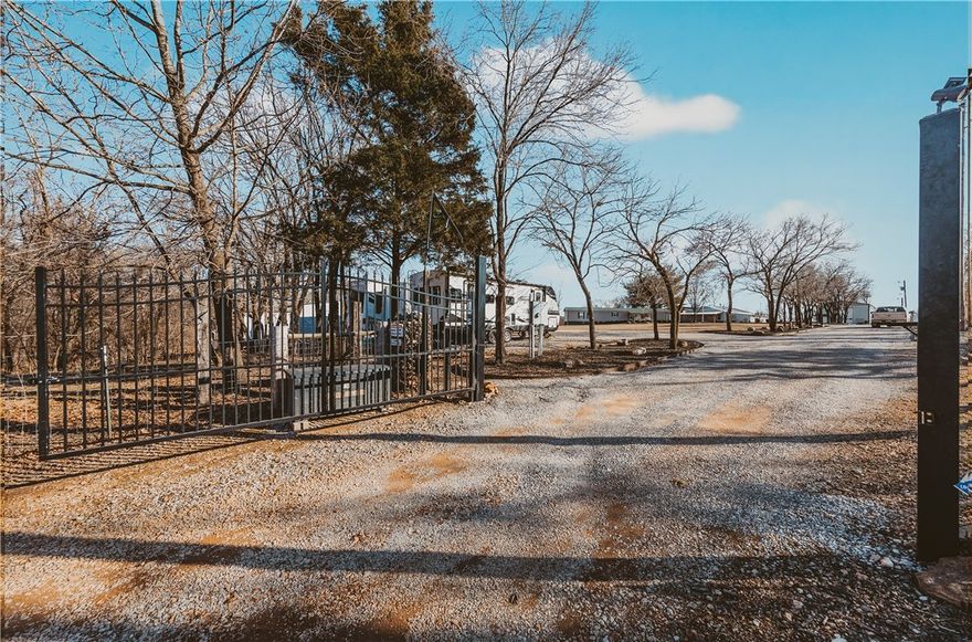 A multi-use property. It's outside the norm. Rental Income? Family compound? This gated 10 acre property host an upscale 2 br/2 bth barndominium main residence with an adjoining covered RV pad 18 x 56 with full hookups. A detached metal shop building apprx 3,000 sf, insulated, with kitchen, 2 bath and laundry, chain hoist, 2 woodstoves and AC.  24 x 90 Greenhouse with Thermal air system, fans and lights. There are 10 RV pads with full hookups,4500 gal septic, and 4 additional homesites currently occuppied The 4 additional privately owned homes might be available to purchase separately. That's a potential rental of 14 full service setups at $500-$750/month per site. New pond with aereation system and a large basement foundation started for an additional building pad. Shooting range and lots of additional space for added uses. Qualified buyers only please.Financials requested.
Pictures to be updated when weather permits. Also listed as a commercial property.