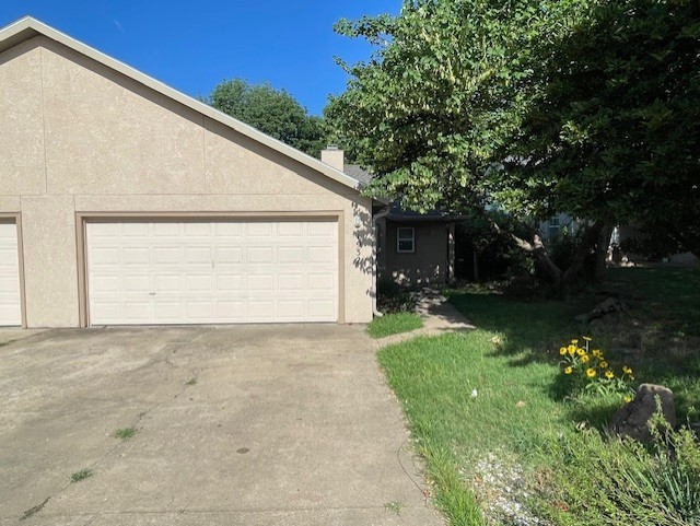 Spacious and move-in ready 3-bed, 2-bath duplex solid-surface floors throughout. The open kitchen/living area features a wood-burning fireplace, each bedroom includes a walk-in closet, and all appliances are included. Conveniently located near Northwest Arkansas Mall, Rogers Aquatic Center, local parks, shops, and dining. The fireplace is for display only. **No pets allowed.**